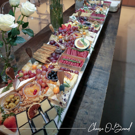 Cheese Grazing Table by Cheese on Board